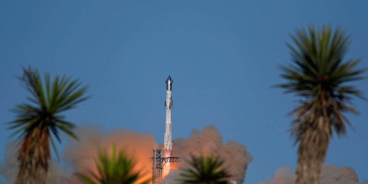 SpaceX launches giant Starship rocket, but aborts attempt to catch booster with mechanical arms