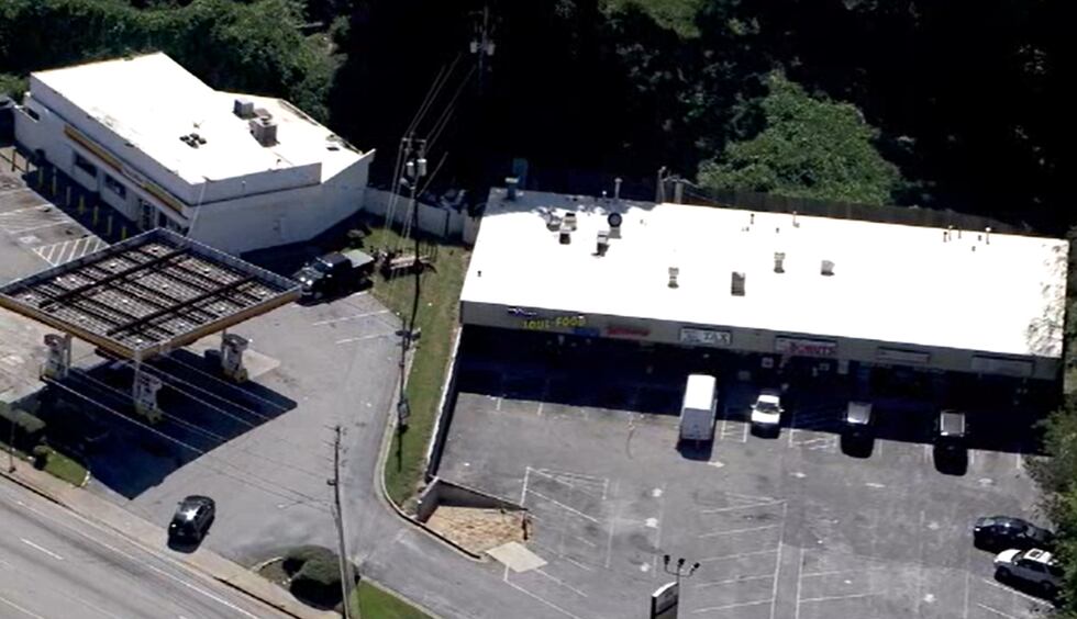 Police said they are investigating the death of a person at a south Atlanta strip mall Monday.
