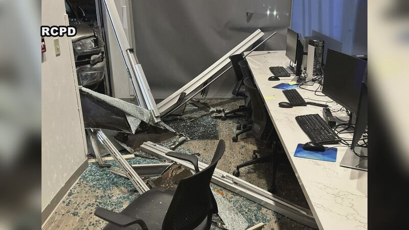 Car crashes into Rapid City Police building early Sunday morning.